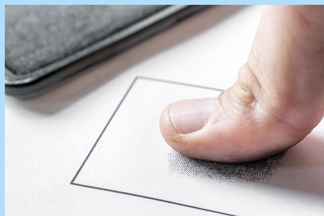 person submitting their fingerprints for the Florida public adjuster license