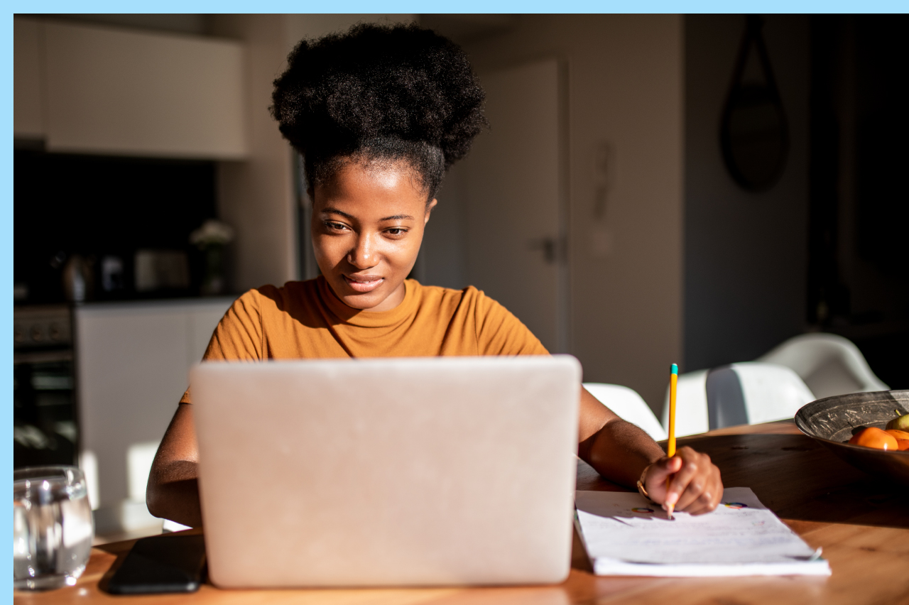 woman studying on her laptop