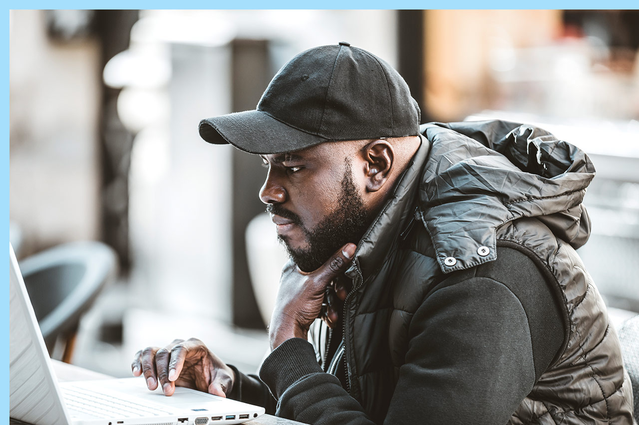 person looking at laptop